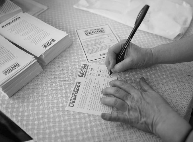 Woman killed, 3 wounded as tensions rise with Venezuela vote